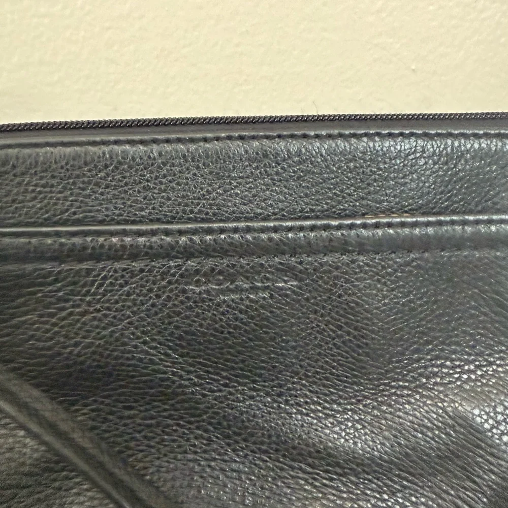 Coach Black pebbled Leather wristlet/wallet with exterior pocket